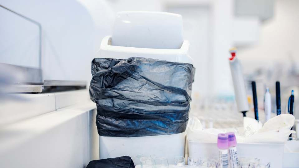 lab waste stored in bin 