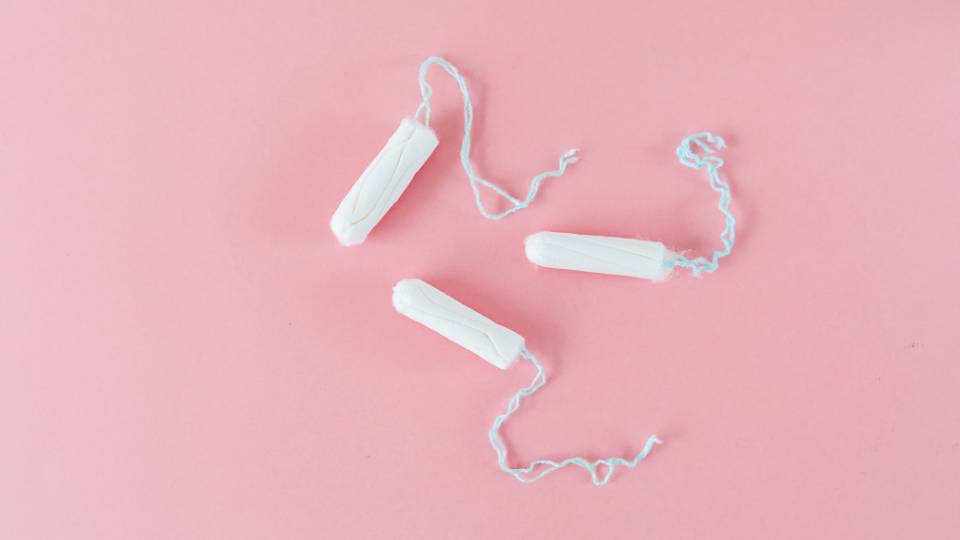 some tampons on a pink background