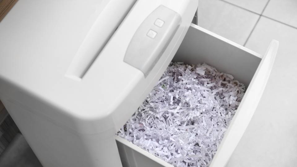 confidential waste bin with shredding inside