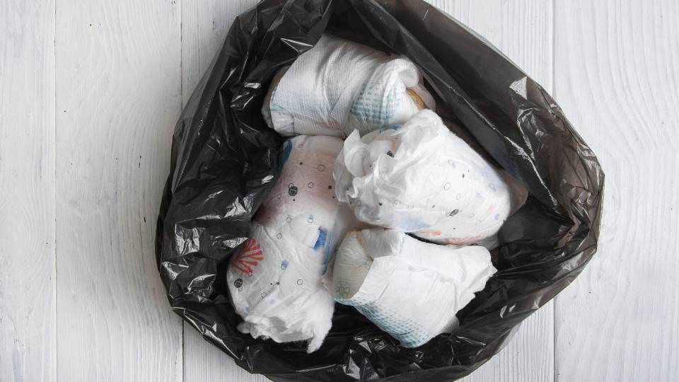 lots of nappies in a bin