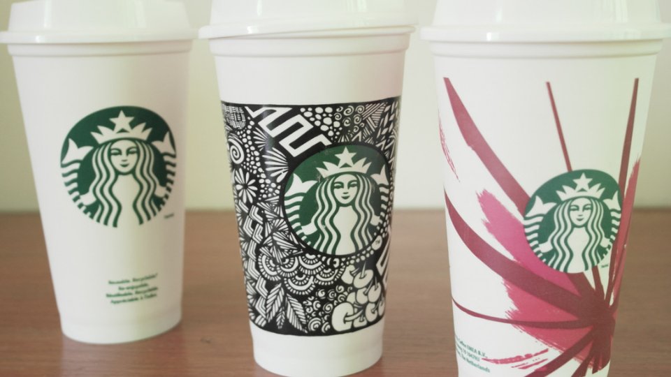 Three Starbucks reusable cups