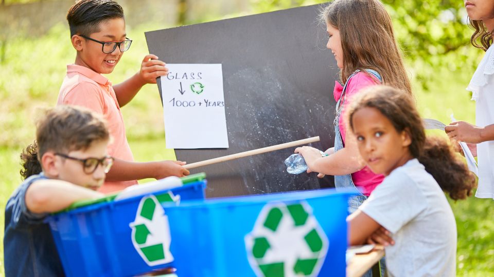 A group of children learning about recycling.