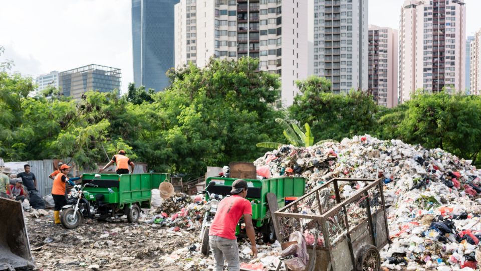 Land filled with waste in a city.