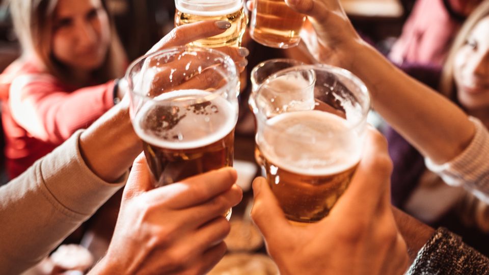 Group photo of pints at a pub.