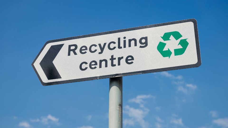 a sign for a UK recycling centre