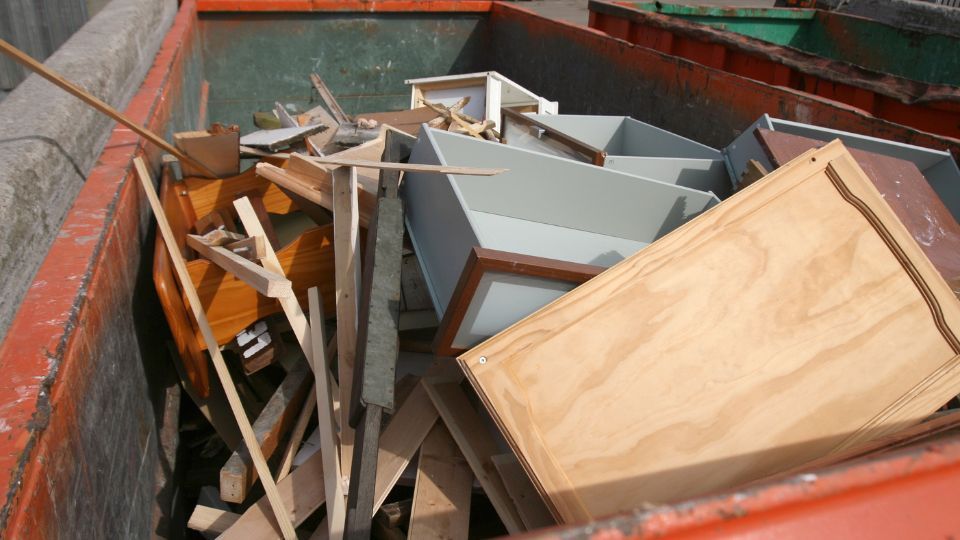 the inside of a big bin at a UK tip