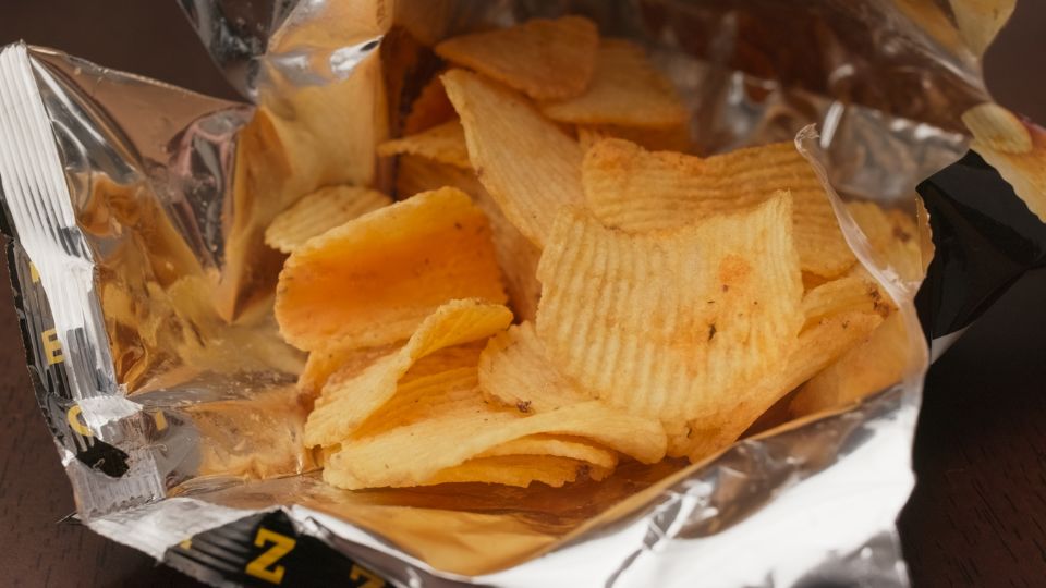 Crisp packet with crisps inside not recyclable