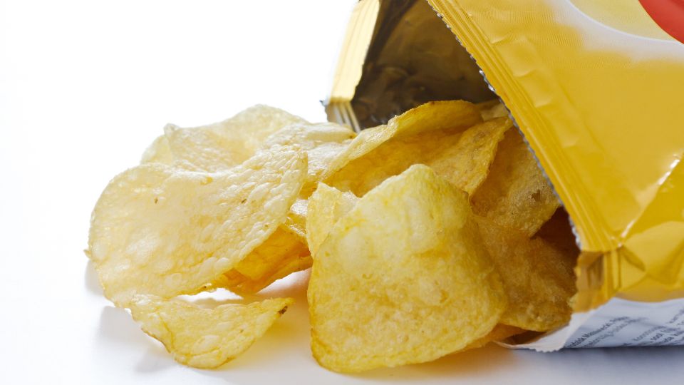 crisps spilling out of a crisp packet