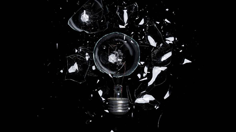 smashed and broken lightbulb needs to be disposed of