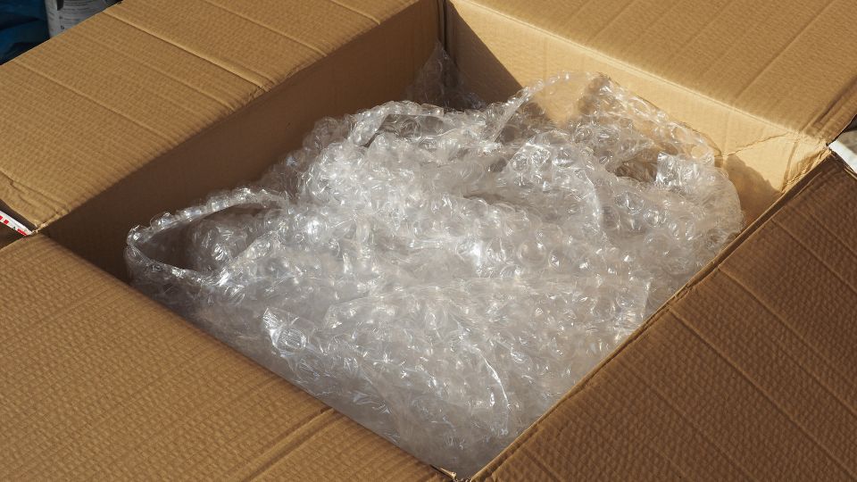 Bubble wrap being stored in a cardboard box.