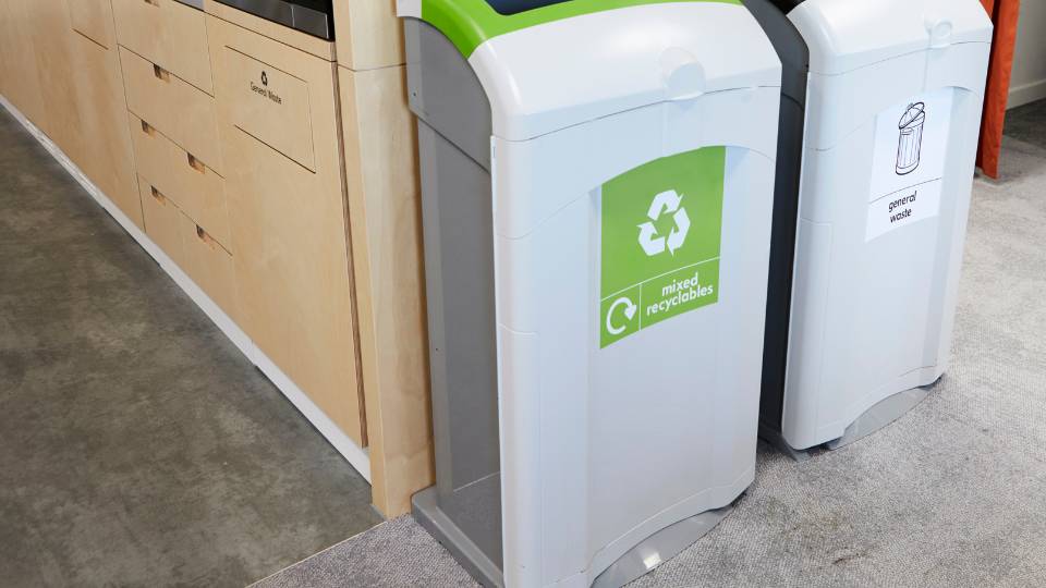 workplace recycling bin in an office