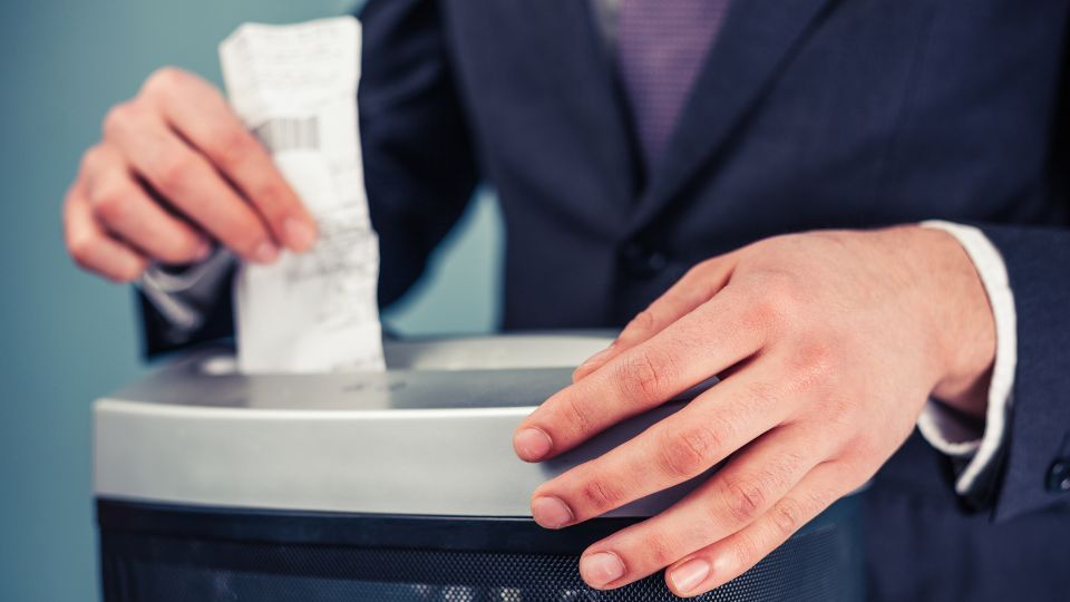 Confidential waste being shredded.