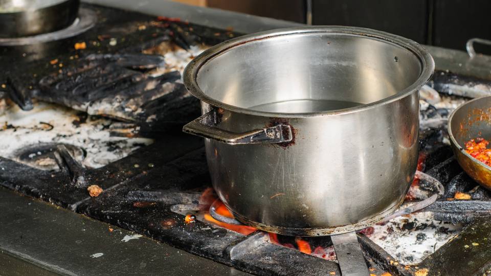 a dirty kitchen from a cafe with a low hygiene rating